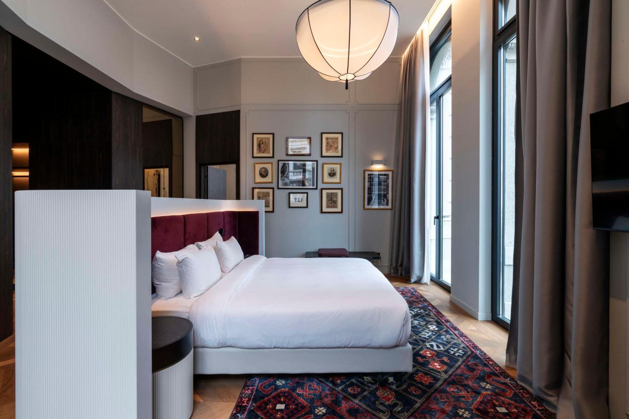Radisson Collection Hotel, Palazzo Touring Club Mailand Exterior foto A bedroom at the hotel