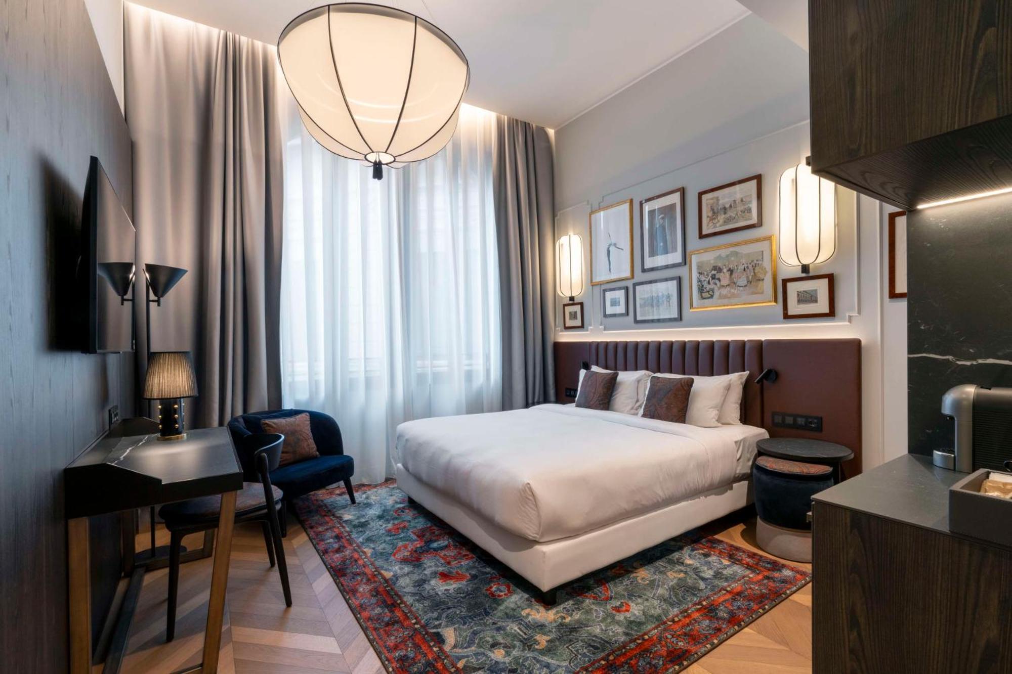 Radisson Collection Hotel, Palazzo Touring Club Mailand Exterior foto A room at the hotel