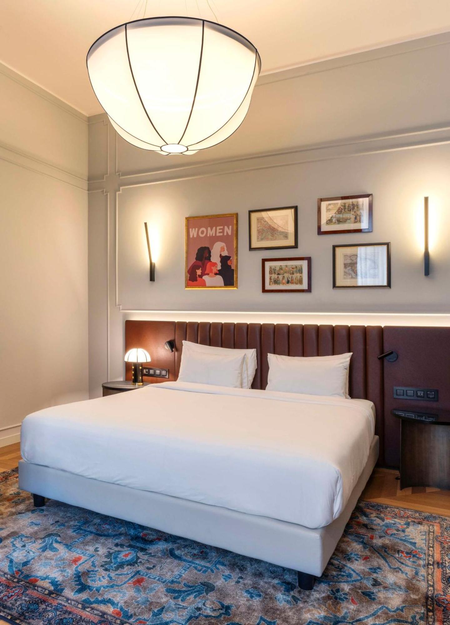 Radisson Collection Hotel, Palazzo Touring Club Mailand Exterior foto A bedroom at the hotel